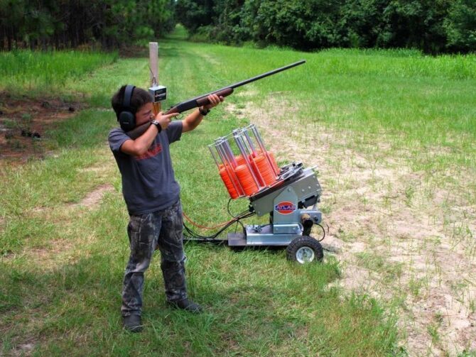 Youth shooter with new clay machine